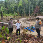 Polsek Meliau Pasang Banner Larangan PETI di Sejumlah Lokasi Tambang Ilegal